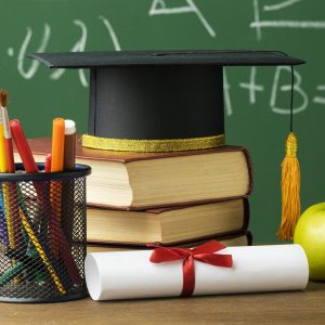 front-view-academic-cap-with-books-pencils